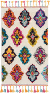 Ivory shag rug with multicolor floral medallions and tassel fringe. Nourison Nomad Area Rug.