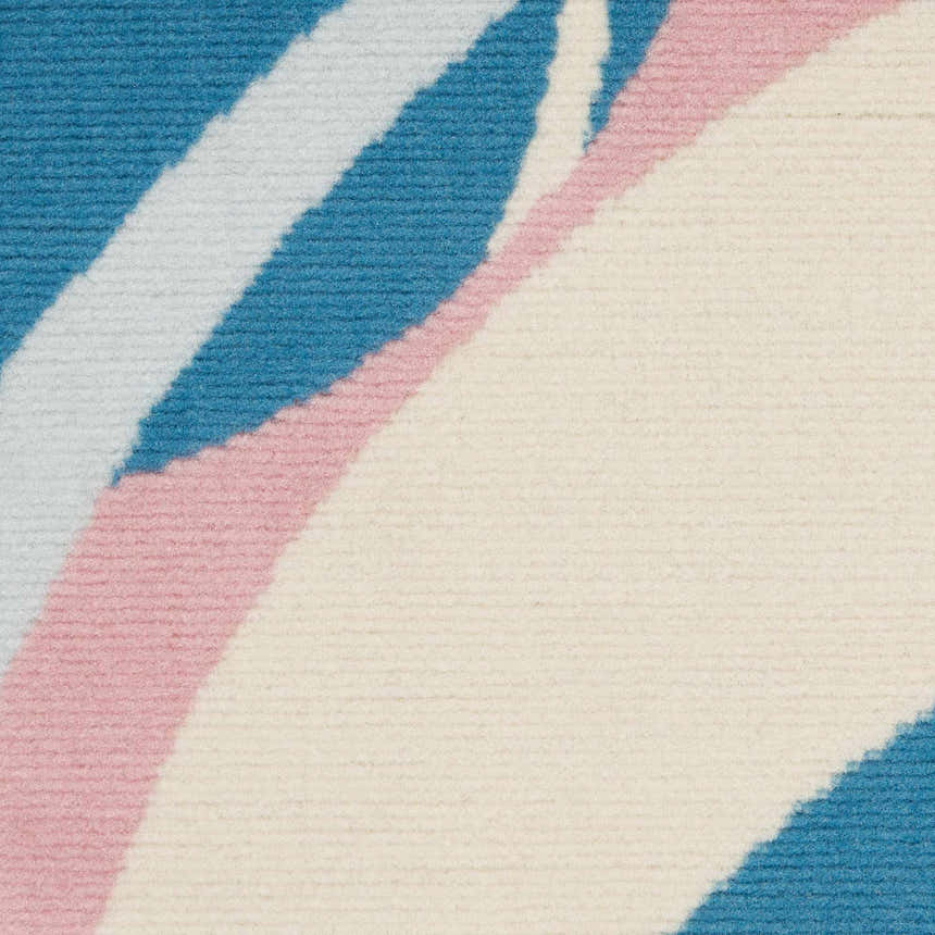 Close-up of the Nourison Grafix Blue Multicolor rug, showing its abstract pattern and soft, textured weave.