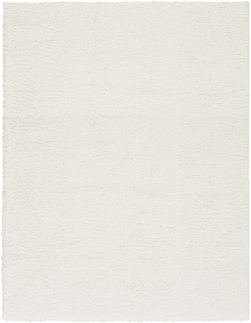 Close-up of the ivory Nourison Modern Shag rug, showing its plush texture and machine-made construction.