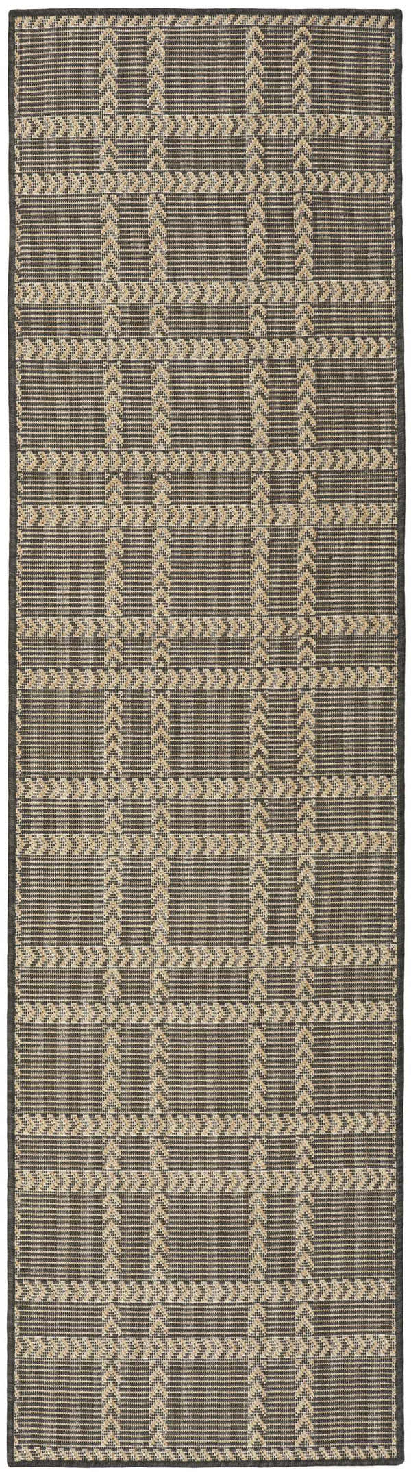 Close-up of Nourison Horizon Charcoal rug showing taupe geometric plaid pattern and texture. Modern indoor/outdoor rug.