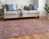 Living room scene with a Feizy Rawlins Red/Tan/Pink rug, cream sofa, blue pillows, and wood floors. Roomscene-Rectangle