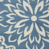 Close up of the Nourison Jubilant Ivory Blue Farmhouse Indoor Area Rug, showing the floral pattern and texture.