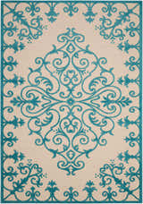 Close-up of the Nourison Aloha Aqua Outdoor Area Rug showing its aqua floral scroll pattern on a beige background.