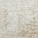 Close-up of the high pile Nourison Dekor Ivory Beige rug, showing chestnut brown accents and soft texture.