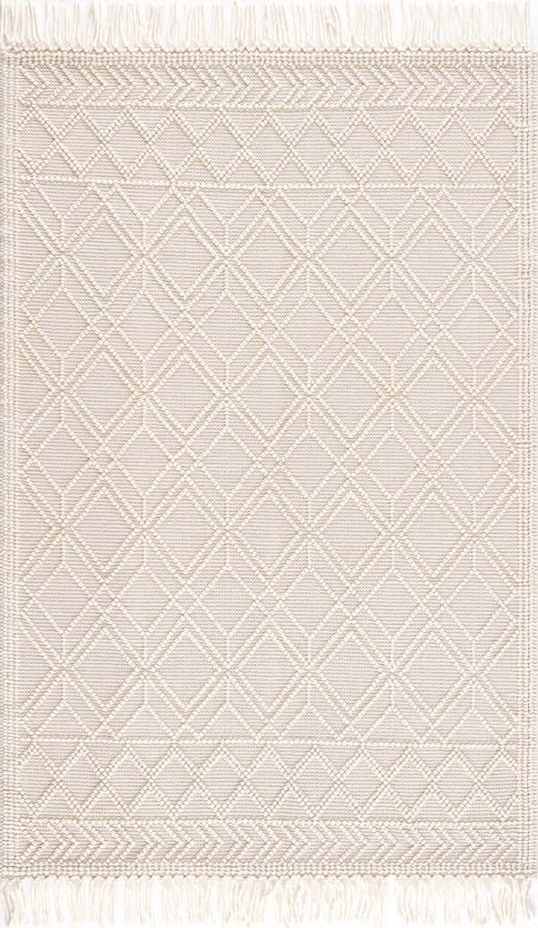 Close-up of the Ramsbury Beige Trellis Wool Rug, featuring a geometric diamond pattern and fringe detail. Ivory, light beige, and peach tones. Design-Rectangle-576