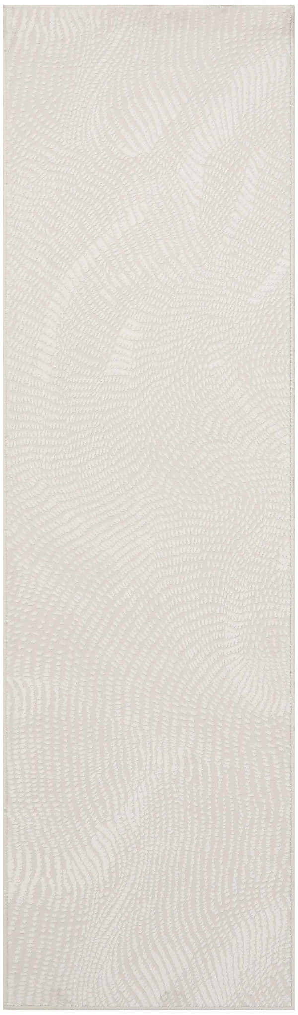 Close up of the DKNY Central Park West Ivory rug showing a textured, abstract pattern.