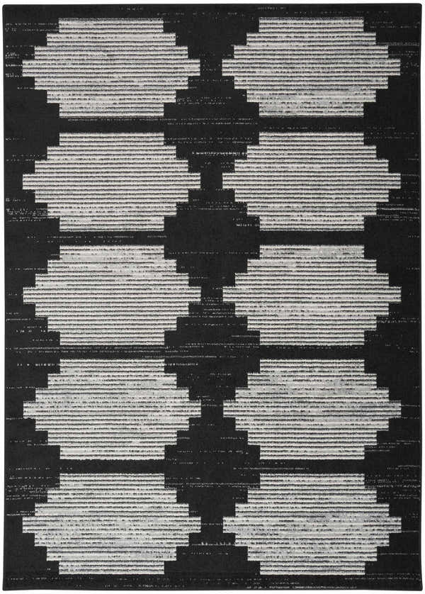 Close-up of the Nourison Modern Passion Black Grey rug, featuring a geometric, mid-century modern pattern.