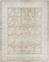 Close-up of the Nourison Dekor Cream Beige vintage rug, showing the high pile texture and geometric pattern.