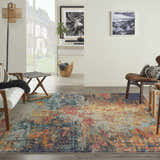 Living room scene with a Nourison Celestial Multicolor rug, white sofa, and mid-century modern decor.