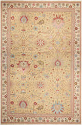 Handmade Nourison Nourmak Gold rug. Floral pattern in gold, red, pink, and blue. 100% wool rectangle rug.