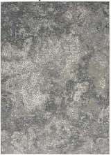 Close-up of the Michael Amini MA90 Uptown Grey rug. Modern design with gray, white, and dark gray abstract pattern.