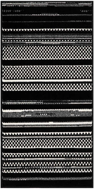 Close-up of the Nourison Grafix Black White rug featuring a modern striped pattern and geometric details.
