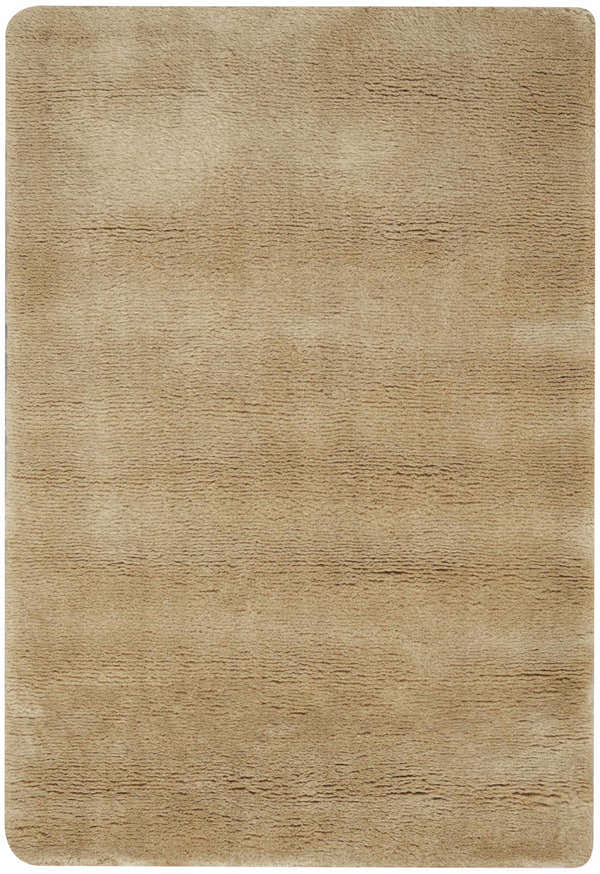 Close-up of the plush Nourison Plush Cloud Camel rug. Handmade, soft cashmere and wool blend texture.