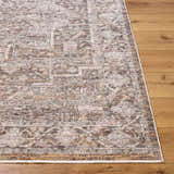 Close-up of the Clovia Area Rug showing its traditional pattern and colors: black, gray, ivory, medium brown, and taupe. Front