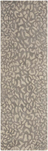 Close-up of the hand-tufted Circa Leopard Print Area Rug, beachhouse and beige tones, 100% wool texture. Design-Runner-268
