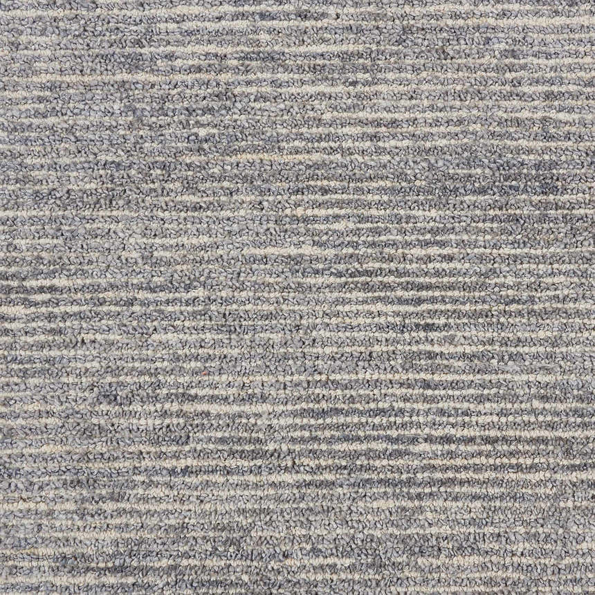 Close up of the Nourison Weston Silver Birch rug, showing its textured weave and subtle horizontal stripes.