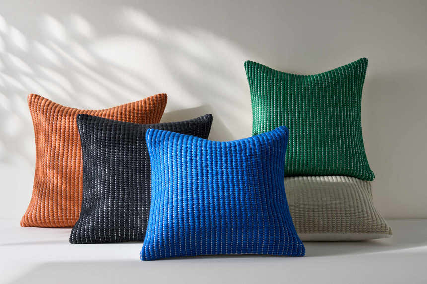 Trory Beige Throw Pillow