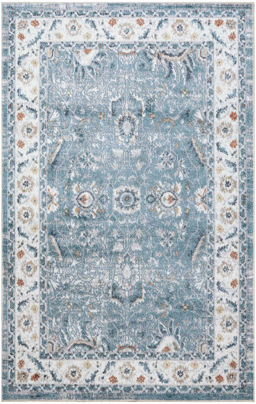 Close-up of the Nourison Astra Blue Vintage Rug. Features a light blue, floral, and vintage design. Washable area rug.