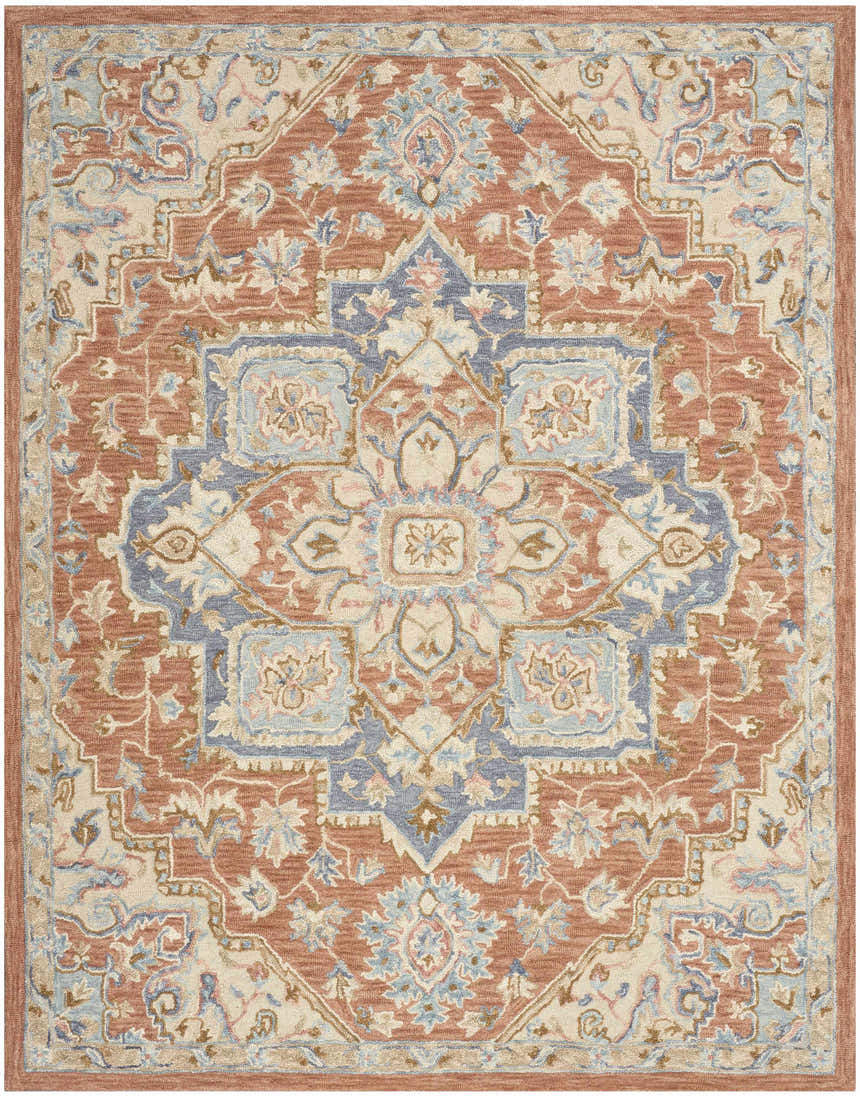 Close-up of Nourison Maison Rust Ivory Vintage Area Rug. Features a chestnut, ivory, and blue floral medallion pattern.