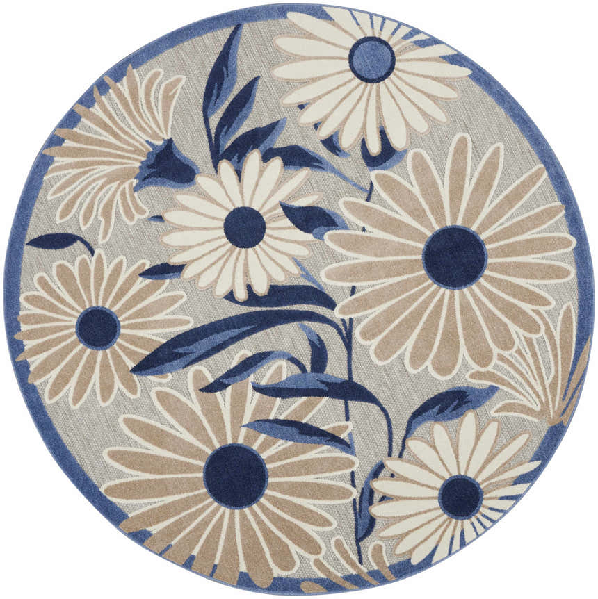Close-up of round Nourison Aloha Blue Grey Outdoor Area Rug featuring a blue, tan, and white floral pattern.