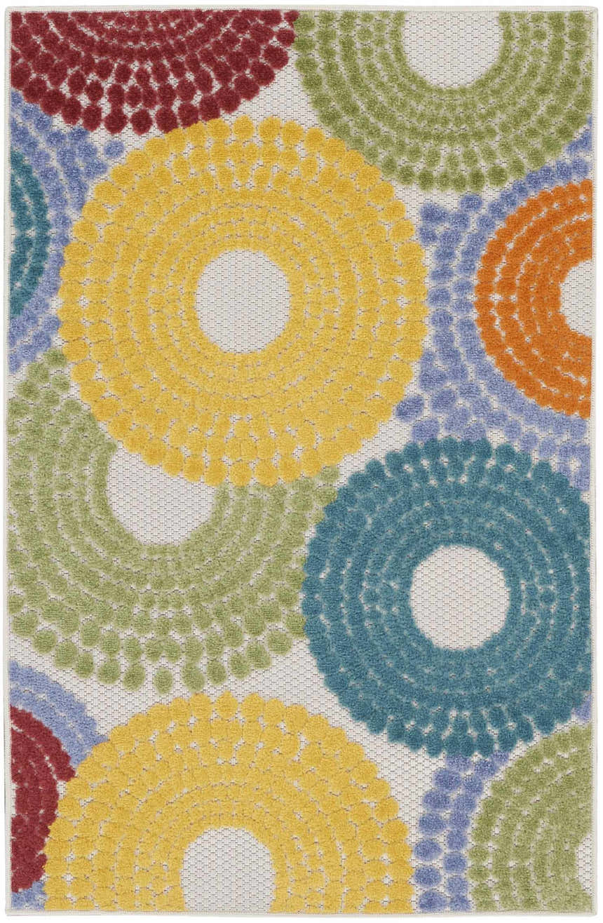 Close-up of Nourison Aloha Multicolor rug with a retro circle pattern in yellow, blue, green, orange, and red.