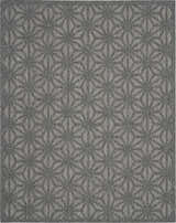 Close-up of the Nourison Cozumel Dark Grey rug featuring a geometric star pattern and subtle texture.