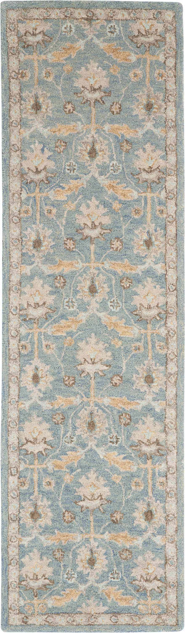 Close-up of Nourison Jazmine Blue Persian rug. Light blue wool rug with beige and brown floral pattern. Handmade rug.