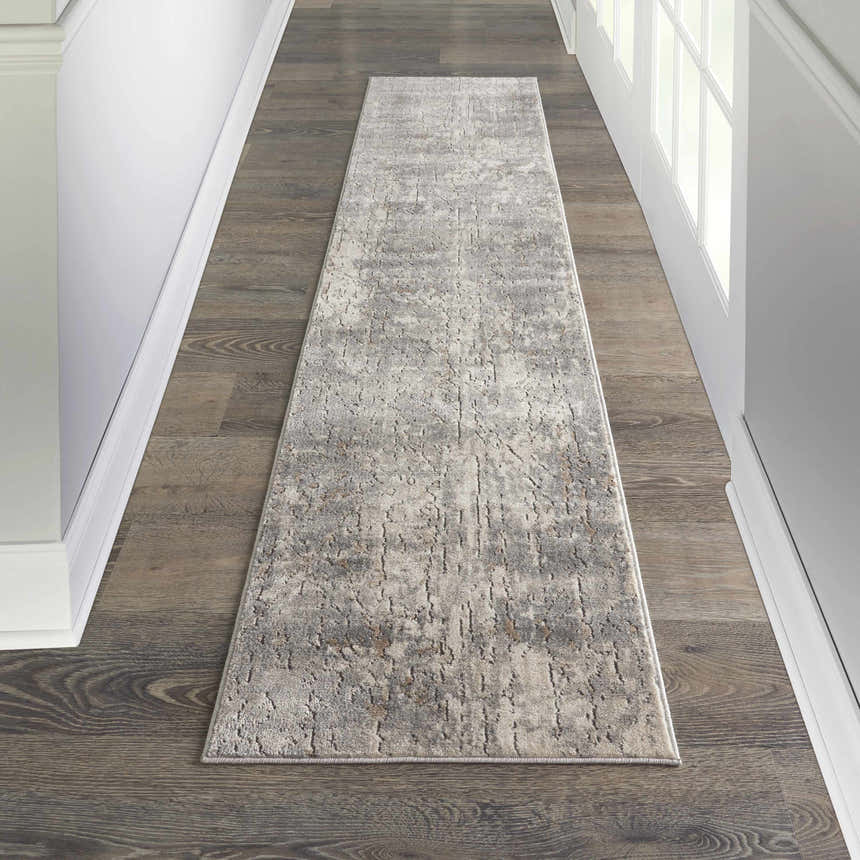 Hallway with Nourison Quarry Beige Grey Modern runner rug on wood floor.