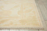 Close up of the Nourison Silk Pointe Ivory Vintage Rug showing chestnut floral pattern and fringe.