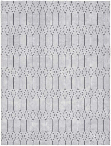 Close-up of Nourison New Concept Ivory Grey rug. Modern diamond trellis pattern on a light gray, textured background.