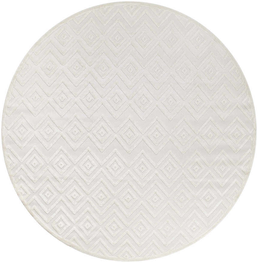 Close-up of the round Nourison Versatile Ivory White rug, featuring a subtle geometric diamond and chevron pattern.