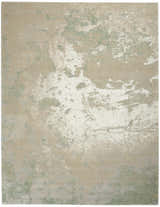 Close-up of the Nourison Twilight Ivory Green rug, featuring a distressed mid-century modern design.