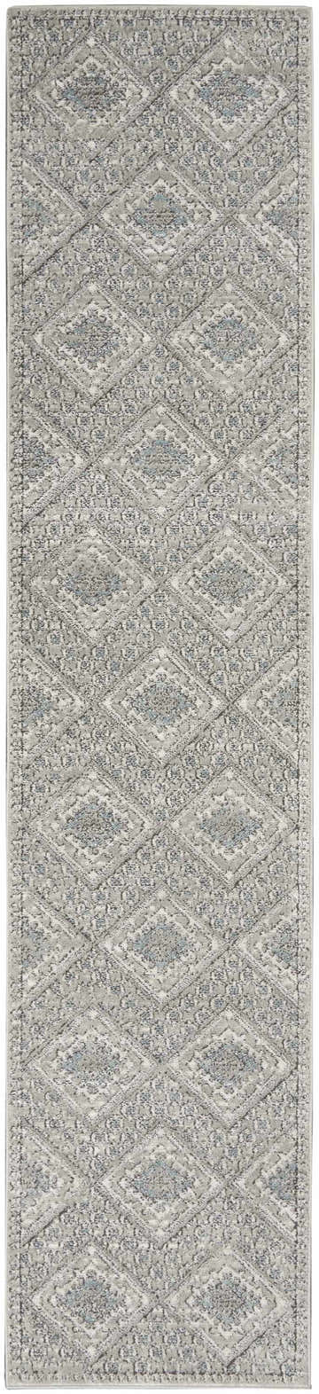 Close-up of Nourison Quarry Grey Ivory Blue Southwestern rug with diamond pattern and subtle chestnut accents.