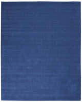 Close-up of the Calvin Klein Las Vegas Navy Retro Indoor Area Rug, showing a subtle grid pattern and wool texture.