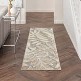 Hallway with Nourison Aloha Natural Tropical Area Rug runner, leaf pattern, wood floors, console table.