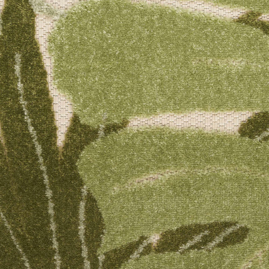 Close up of the Nourison Aloha Ivory Green Outdoor Area Rug showing the green leaf pattern.