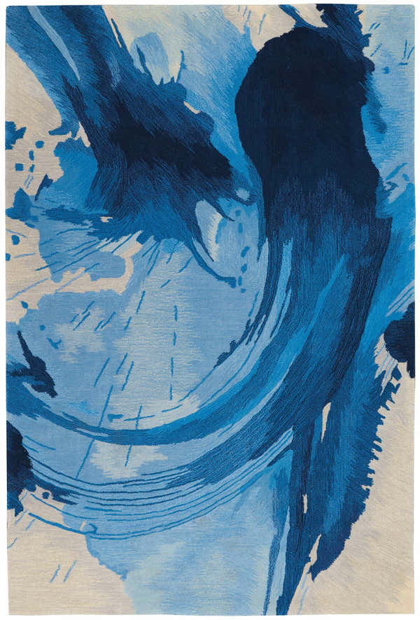 Close-up of the Nourison Symmetry Blue Ivory rug, featuring a modern abstract design with swirling blue and ivory hues.