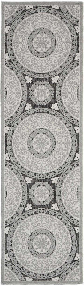 Close-up of the Nourison Key Largo Grey Contemporary Area Rug featuring a gray floral medallion pattern.