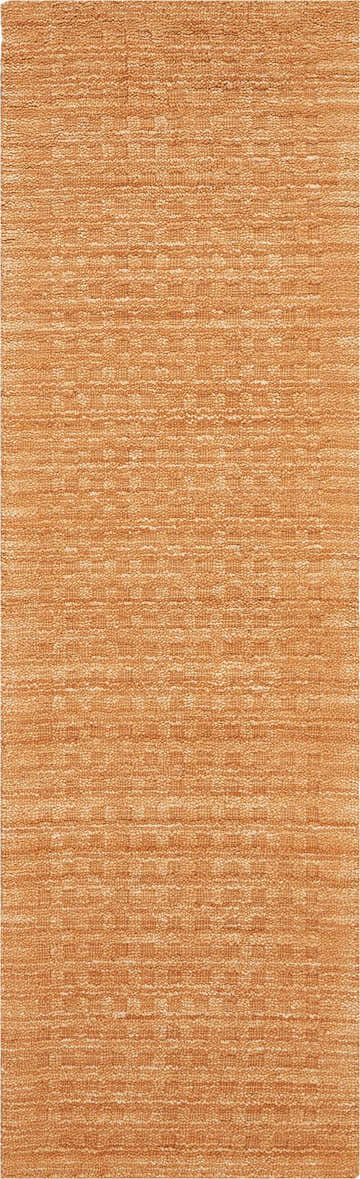 Close-up of the textured Nourison Marana Sunset rug. Contemporary style, sunset color, handmade wool and cotton rug.