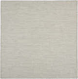 Close-up of the Nourison Courtyard Ivory Silver rug showing its woven texture and subtle chestnut and silver pattern.