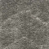 Close-up of the plush texture of the Nourison Dreamy Shag Grey Shag Indoor Area Rug.