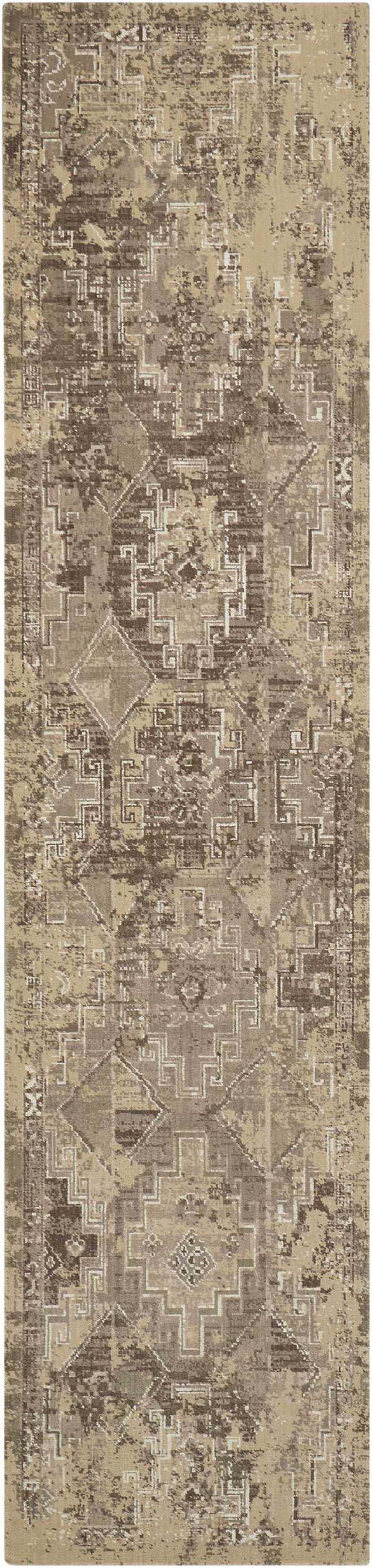 Close-up of Nourison Silk Elements Mushroom Persian rug. Runner with distressed geometric pattern in beige and brown tones.