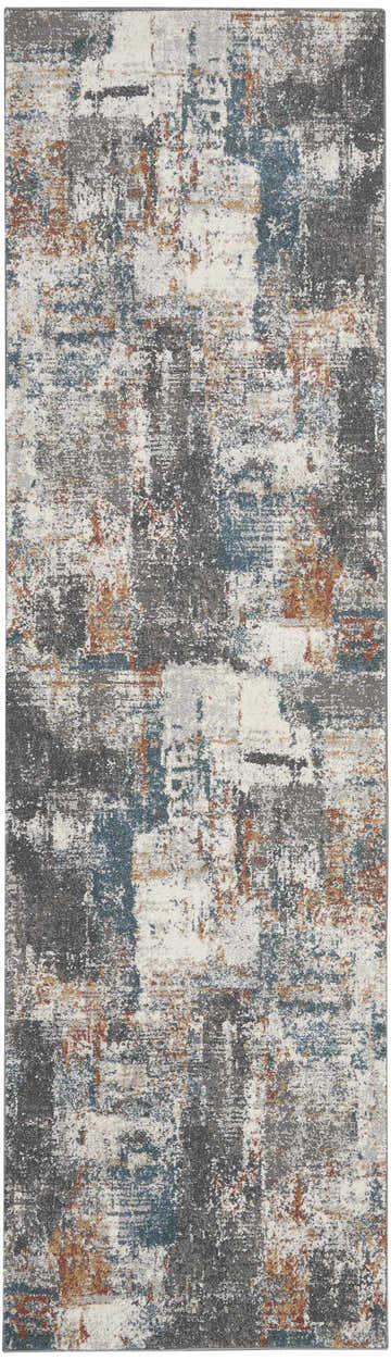 Close-up of the Nourison Tangra Grey Multicolor rug. Abstract design in gray, blue, rust, and white hues.