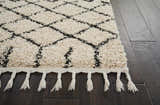 Close-up of the Nourison Moroccan Shag Cream Tribal rug showing its plush texture, diamond pattern, and fringe detail.