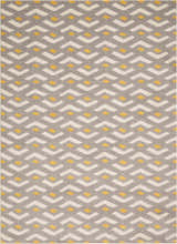 Close-up of Nourison Harper Grey Colorful rug featuring a geometric chevron pattern with gray, white, and yellow.