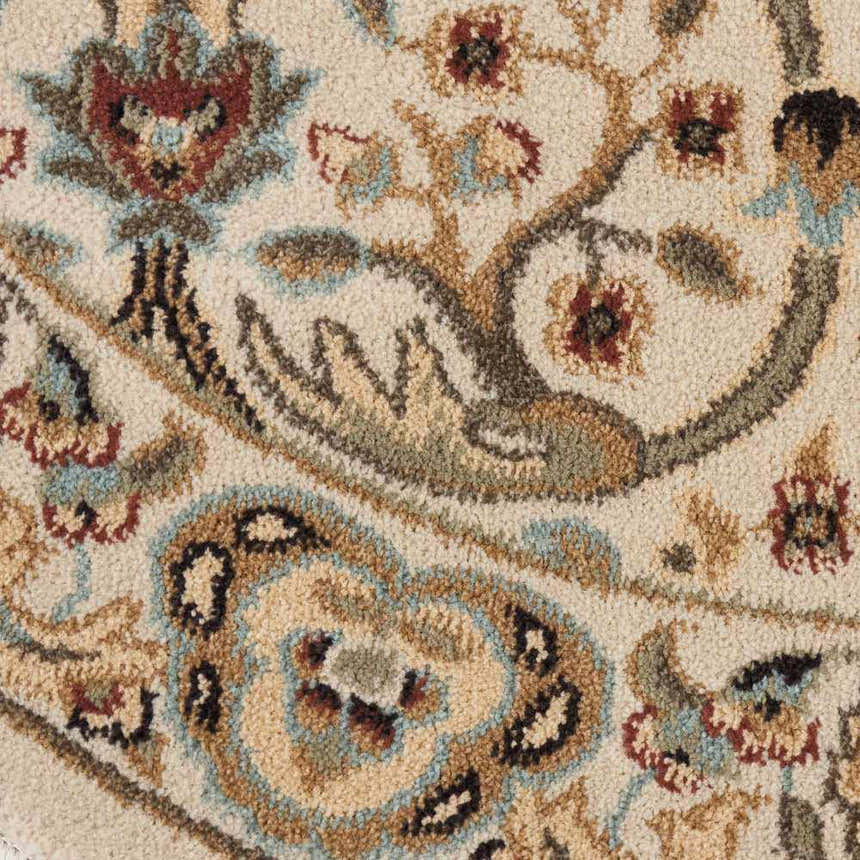 Close-up of the Nourison Walden Ivory Indoor Area Rug, featuring a floral chestnut, brown, and blue pattern.