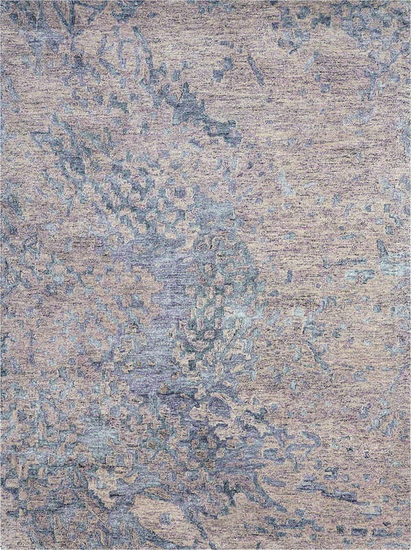 Close-up of the Nourison Gemstone Sapphire Rug. Abstract blue and beige pattern with a subtle mid-century modern style.
