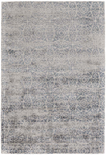 Close-up of the Feizy Nadia blue, gray, and taupe area rug. Transitional style with a distressed vintage pattern. Design-Rectangle