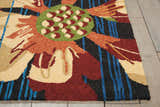 Close-up of the handmade Nourison South Beach Black Area Rug, featuring a large floral design in red, green, and beige.