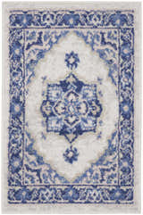 Close-up of Nourison Whimsicle Ivory Blue Farmhouse rug, featuring a traditional floral design with chestnut accents.